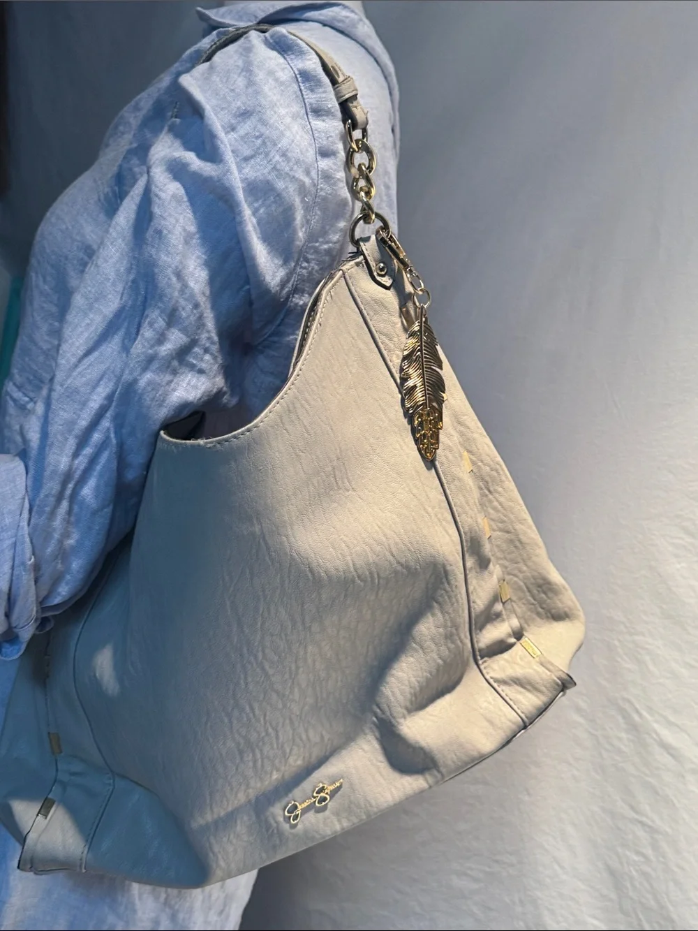 Jessica Simpson Cream Hobo Shoulder Bag with Gold Feather Charm